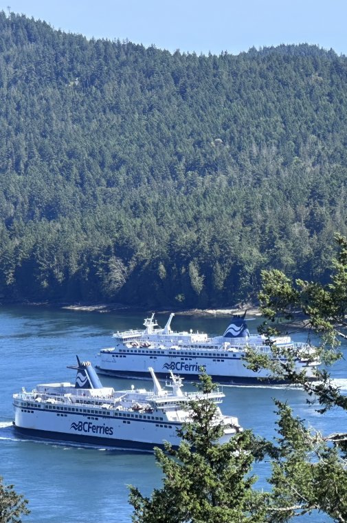 Ferries crossing in the tight channel Ferries crossing in the tight channel
